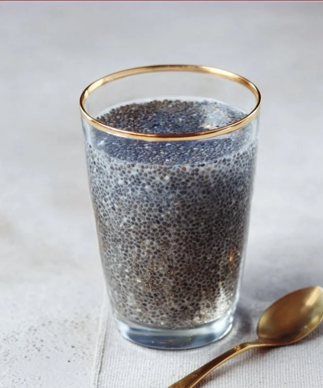 Chia seeds water in a glass, showcasing weight loss benefits and healthy recipes.