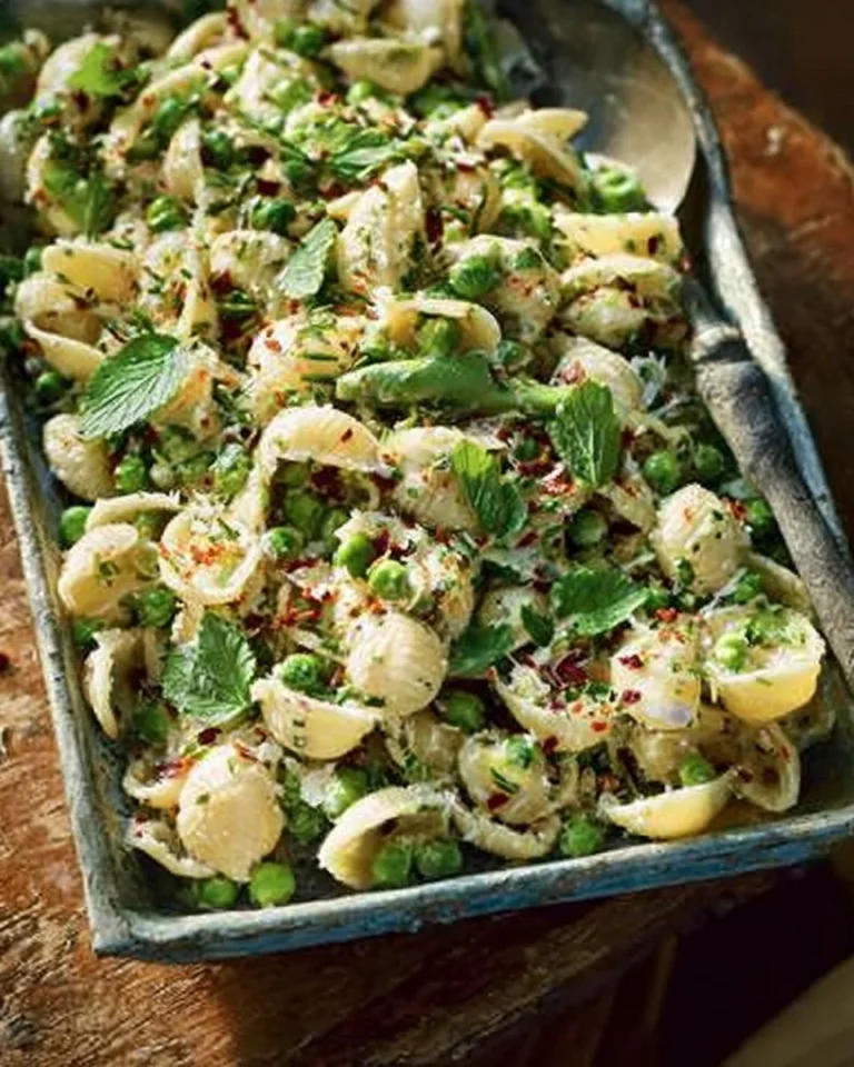 Delicious Roasted Feta Conchiglie with mint, chili, and lemon served in a bowl